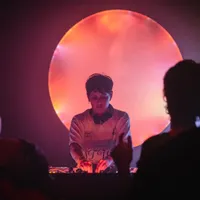 Radio Radio DJ playing music and people dancing