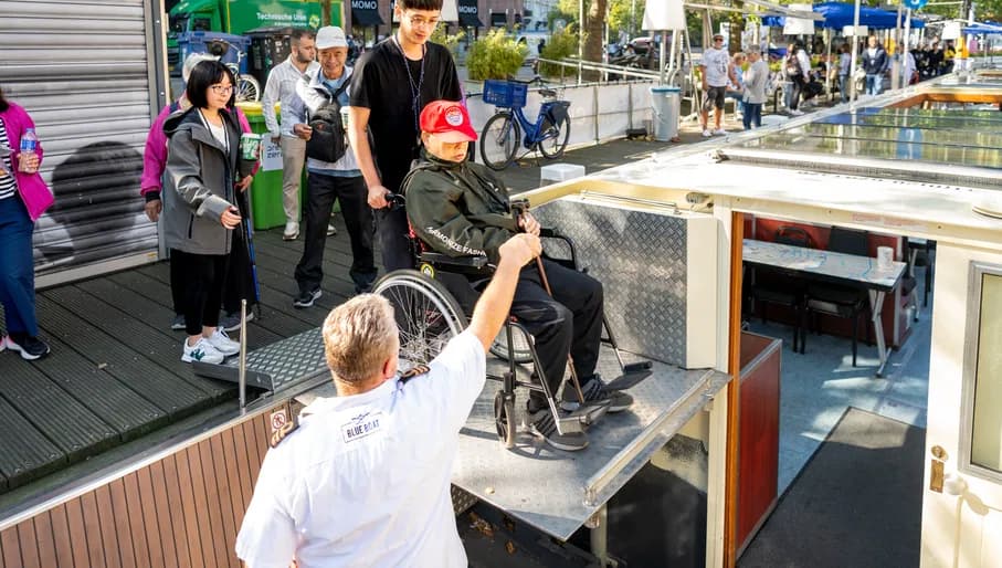 Wheelchair user accessing canal cruise