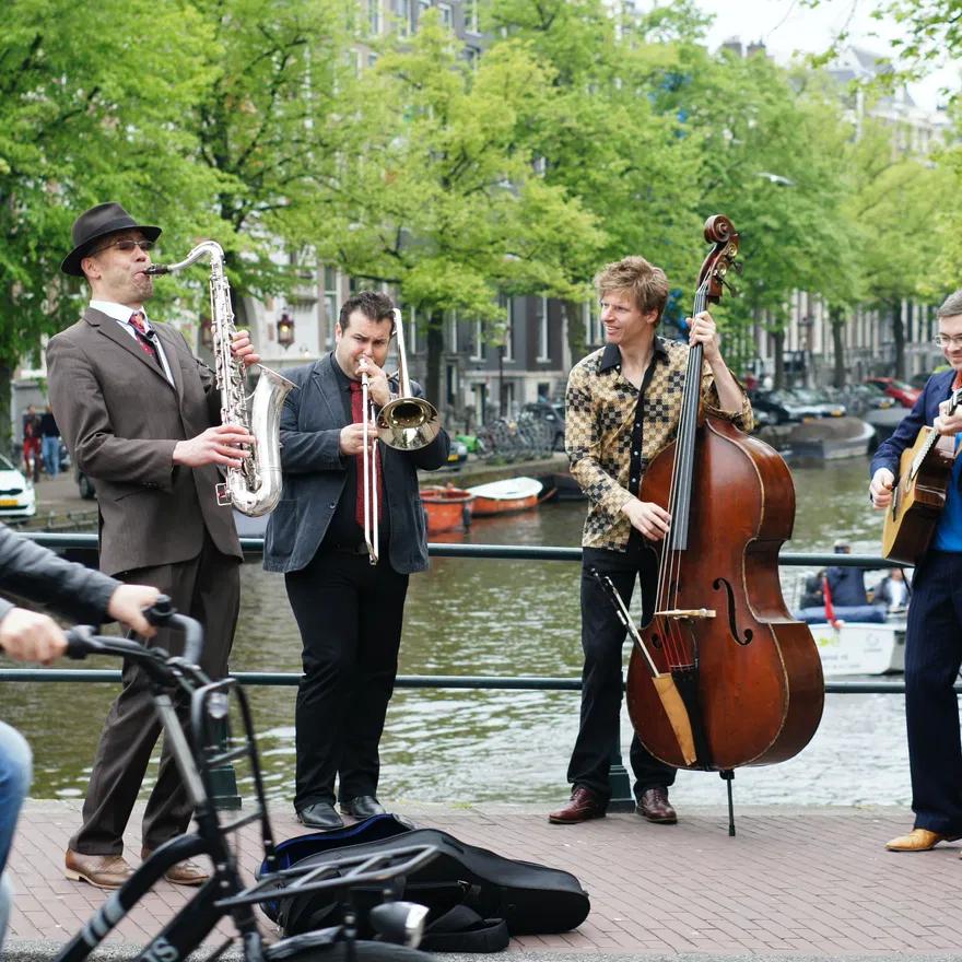 Jazz street musicians jamming by the canal.