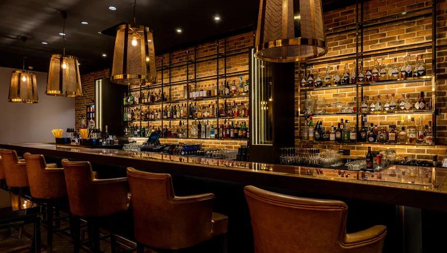 Back bar at Anantara Grand Hotel Krasnapolsky Amsterdam hotel bar The Tailor