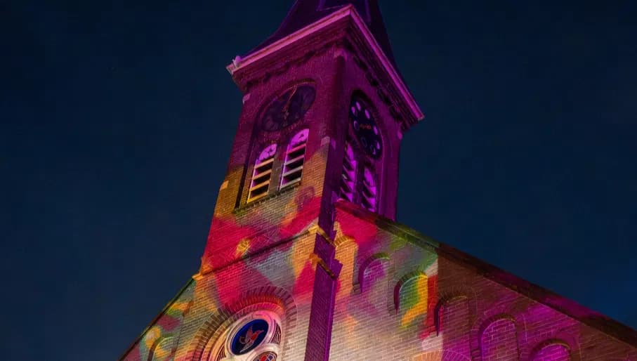 Ruigoord colourful reflection on the church by night