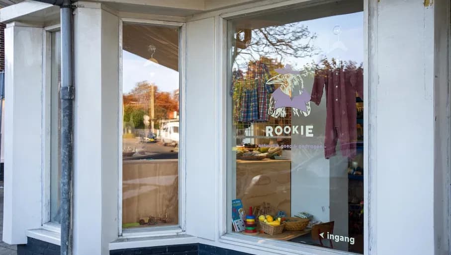 Rookie, store for children items. Exterior, window with clothes hanging. 
Content Creation Day in Amsterdam Noord, North