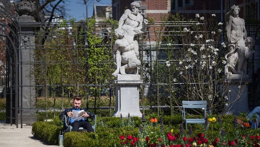 Rijksmuseum garden man reading his book