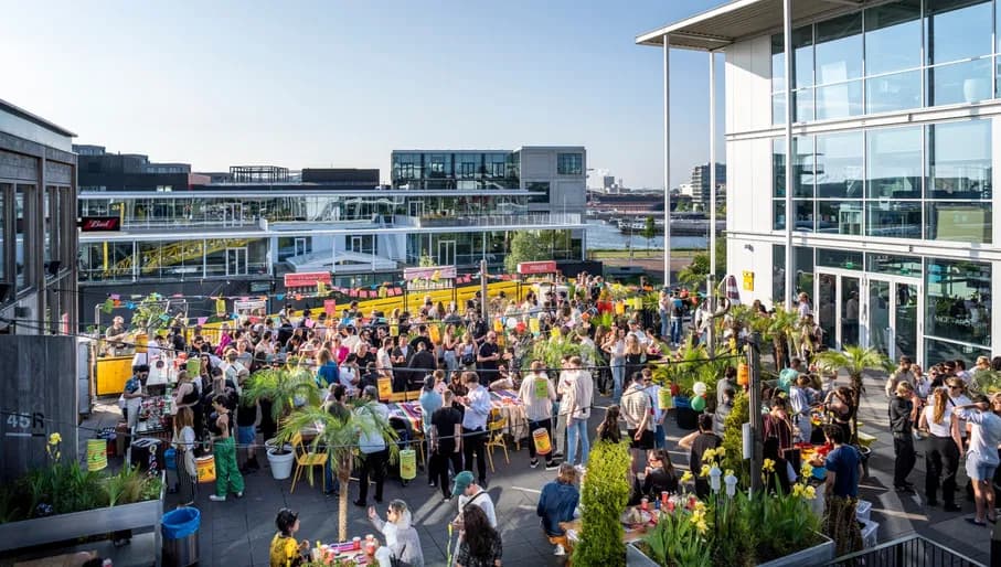 Yellow House event with people on the terrace