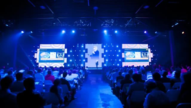 Woman giving speech, Main stage, World Summit AI 2023 conference at Taets Art and Event Park