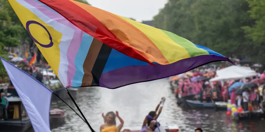 Big rainbow flag during the Canal Parade of Amsterdam Pride 2025.