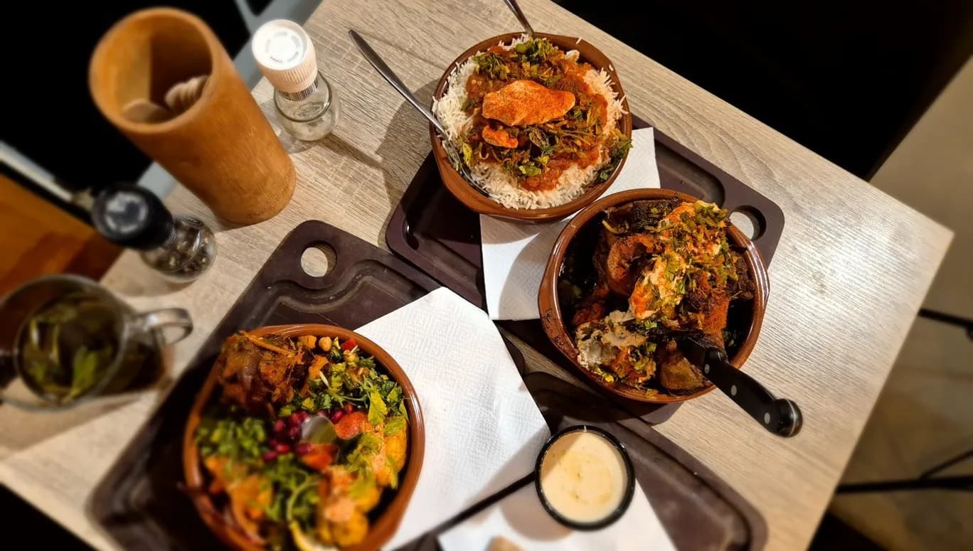 Dishes at Hawawshi Egyptian streetfood restaurant on Kinkerstraat