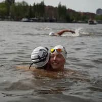 Couple of swimmers embracing during LoveSwim 2024