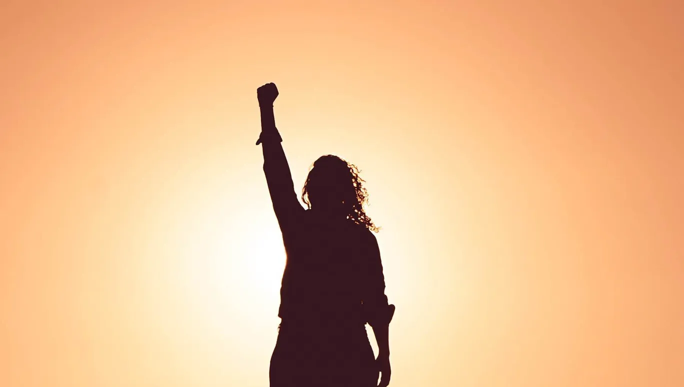 woman with a raised fist