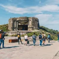People walking at the Amsterdam Beach Forteiland Ijmuiden -Bunker