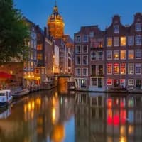 Amsterdam at night
126414503
Amsterdam Red Light District Armbrug at night with canal. Via Shutterstock