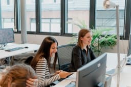 Alexandra Belicova and Kriya Mehta at the office