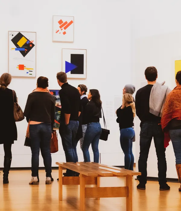 People looking at art in the Stedelijk Museum for Amsterdam Culture Club