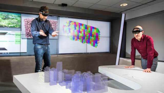 Two men with virtual reality glasses