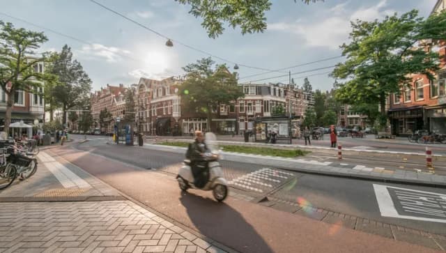 Scooter on Cornelis Schuytstraat street view in Oud-Zuid