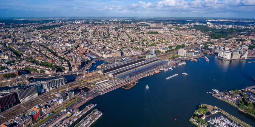 City aerial view over Amsterdam, The Netherlands. View from the bird's flight