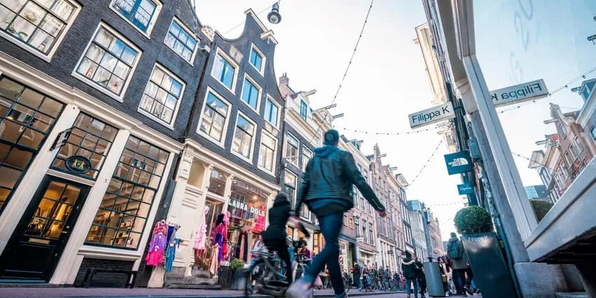 Shoppers at the Negen Straatjes shopping area.